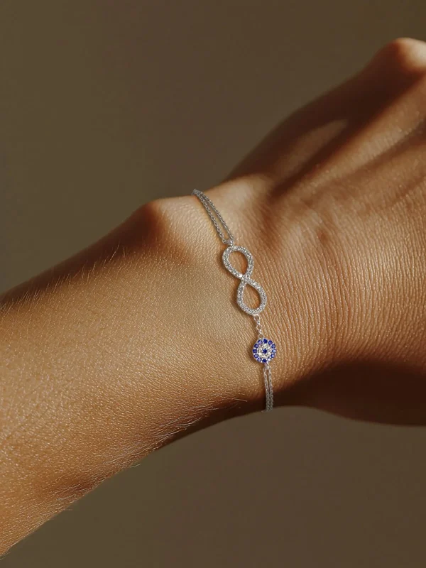 Silberarmband mit Unendlichkeit und Böses-Auge-Motiv - Damen Silberarmband